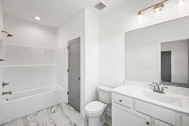 a view of a golf course with a garden