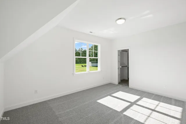 a picture of a bathroom with a shower