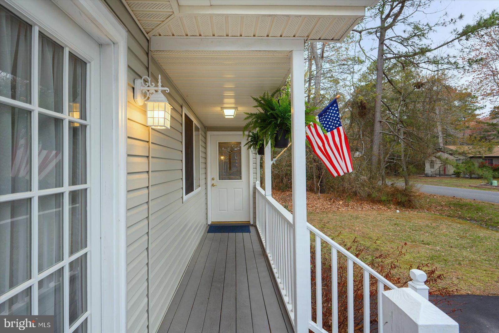 74 Robin Hood Trail Ocean Pines, MD 21811 - Photo 2 of 59 a view of balcony and wooden floor