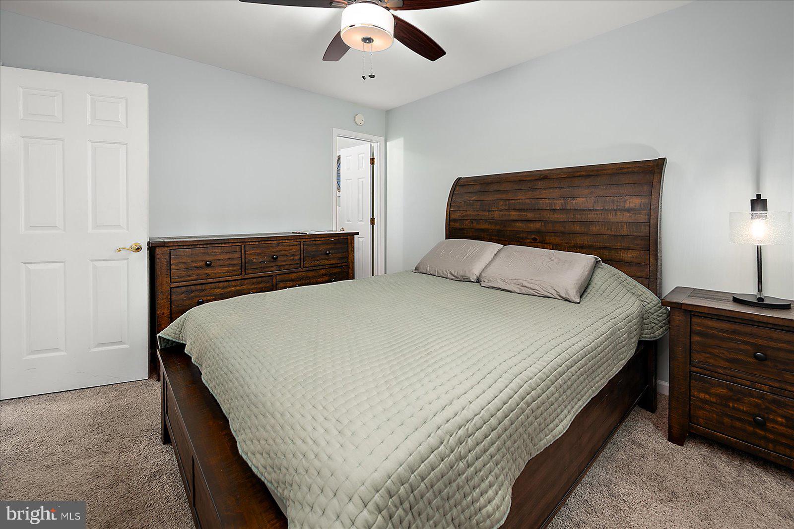 74 Robin Hood Trail Ocean Pines, MD 21811 - Photo 21 of 59 a bedroom with a bed and window