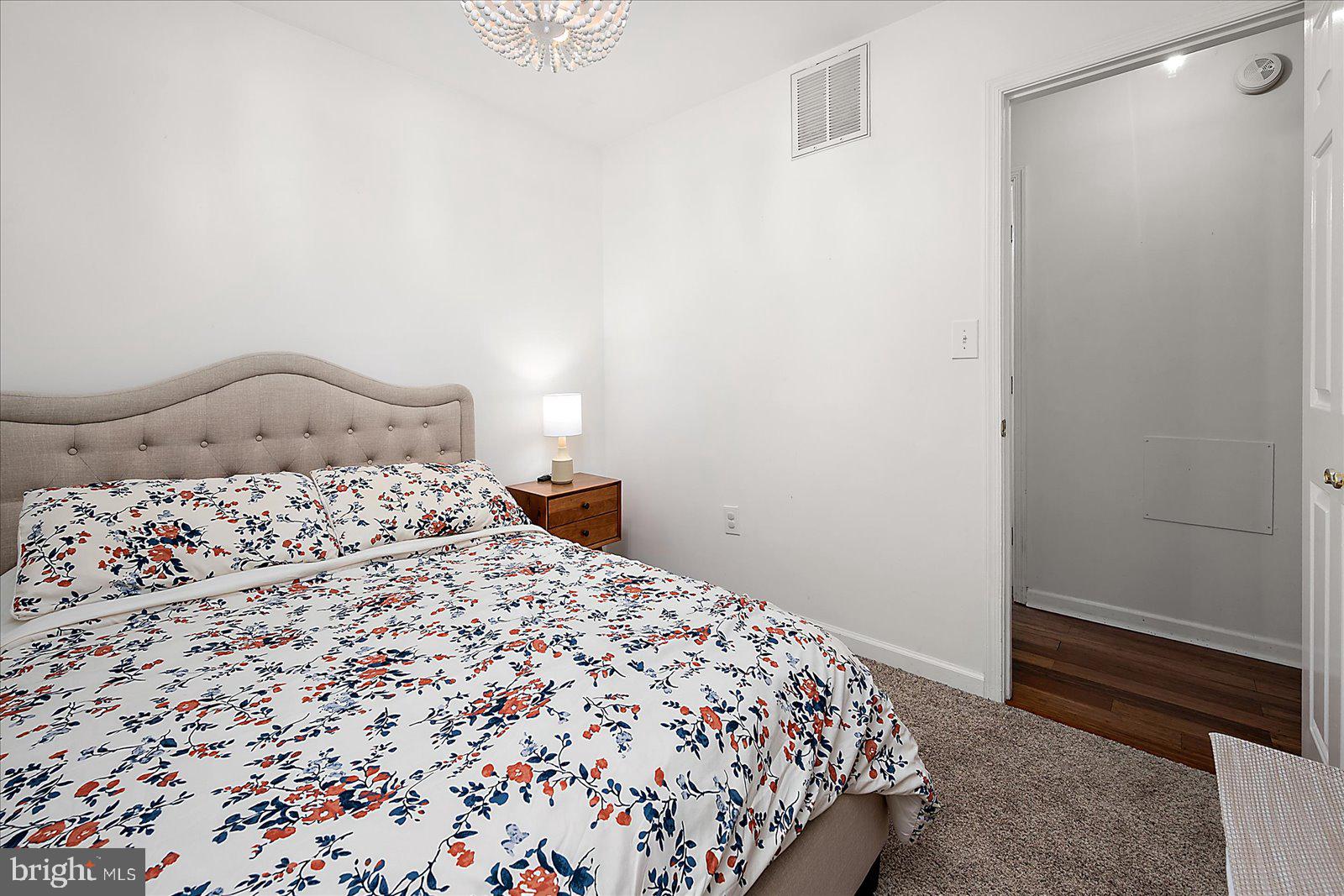 74 Robin Hood Trail Ocean Pines, MD 21811 - Photo 26 of 59 a bedroom with a bed and a window
