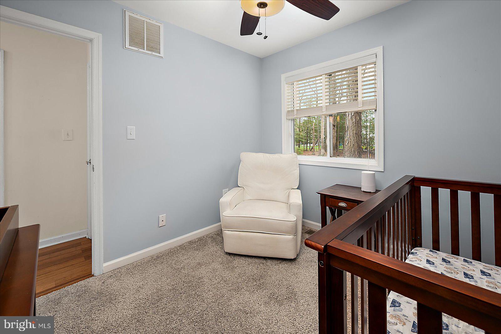 74 Robin Hood Trail Ocean Pines, MD 21811 - Photo 29 of 59 a living room with furniture and stairs