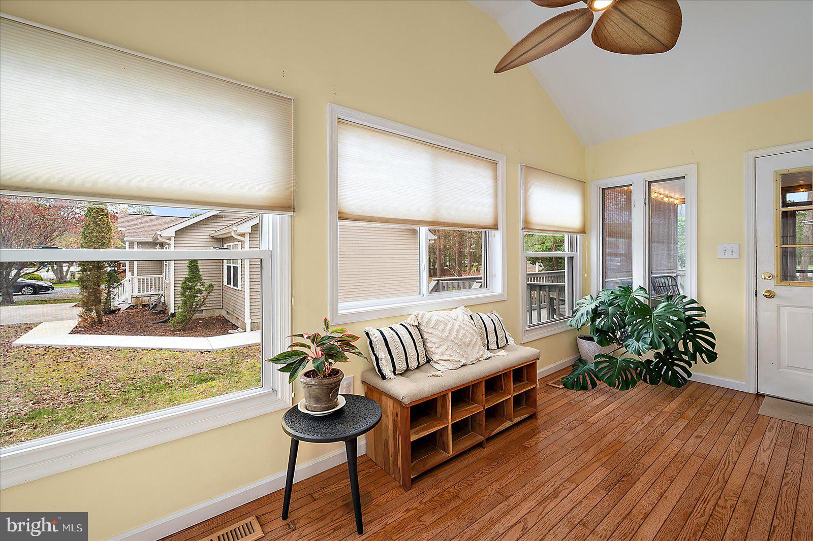 74 Robin Hood Trail Ocean Pines, MD 21811 - Photo 37 of 59 a living room with furniture and a large window