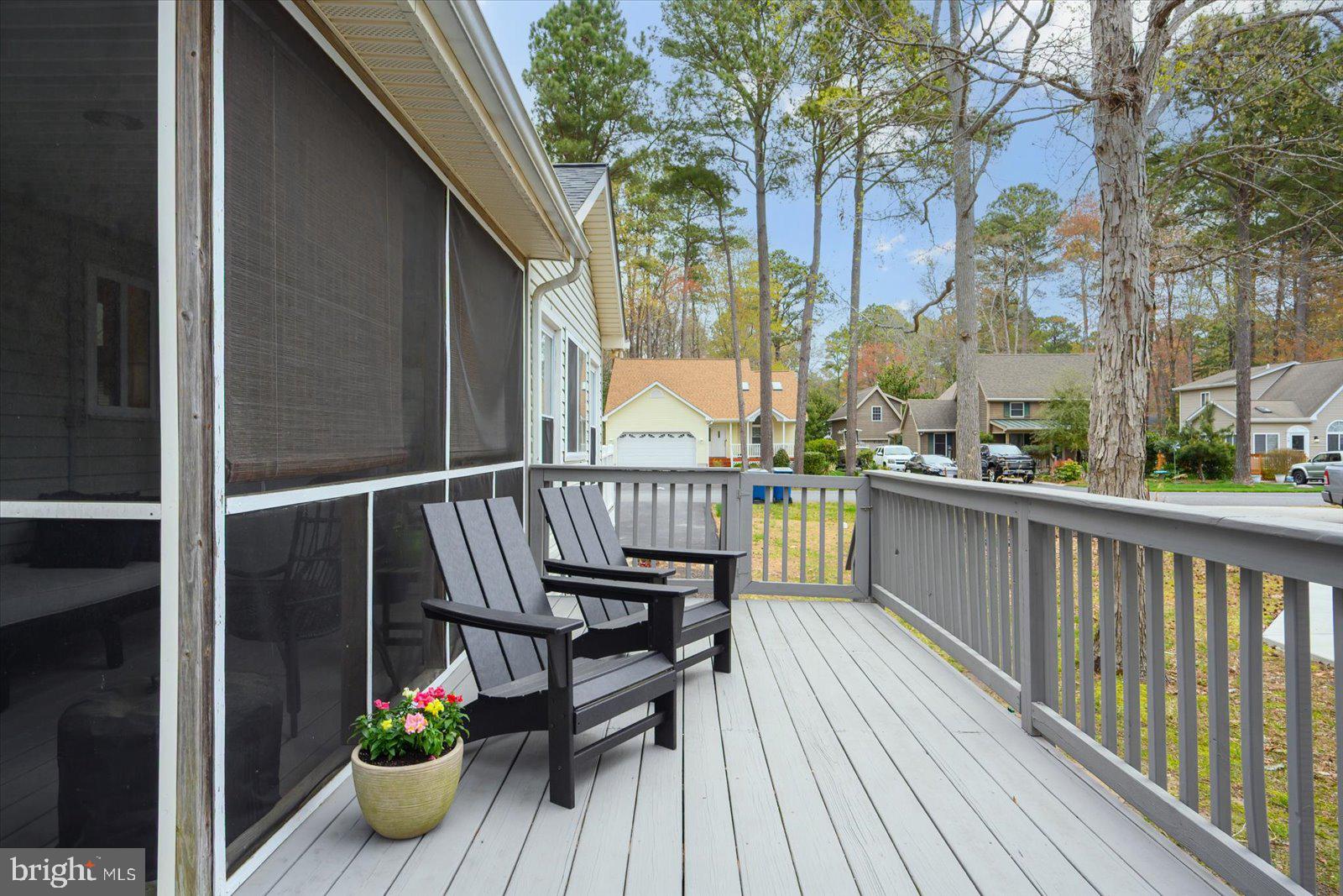 74 Robin Hood Trail Ocean Pines, MD 21811 - Photo 43 of 59 a view of balcony with wooden floor and seating space