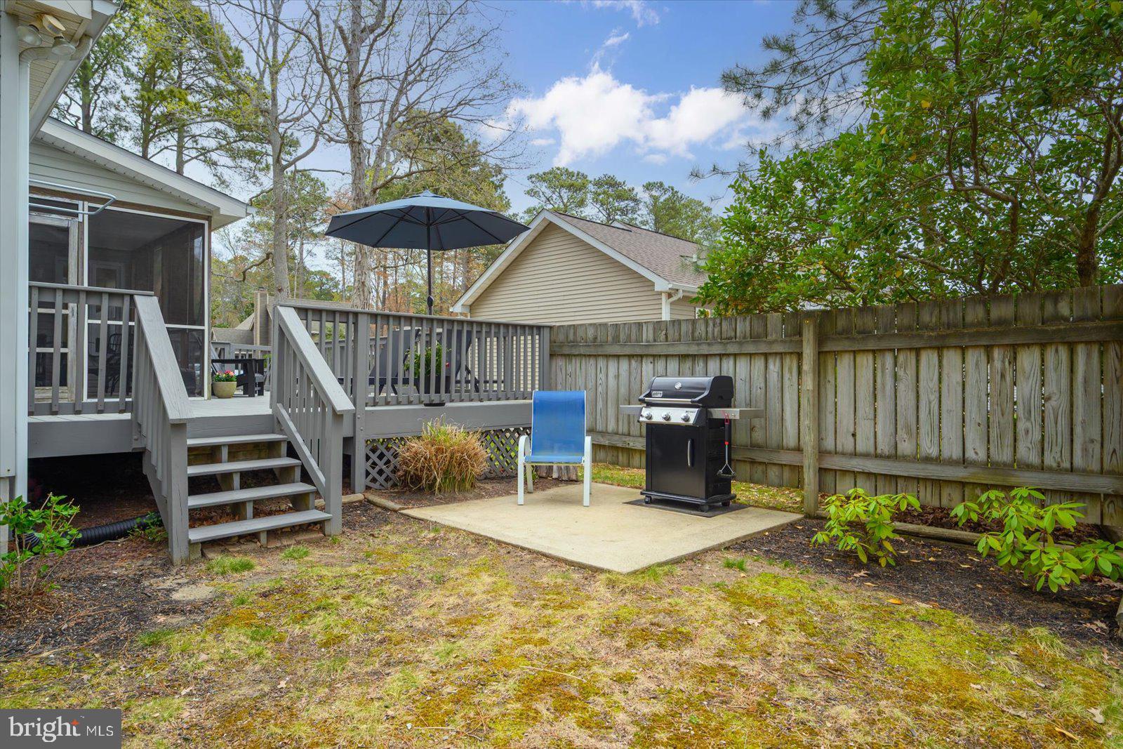 74 Robin Hood Trail Ocean Pines, MD 21811 - Photo 47 of 59 a view of a deck with backyard and tv