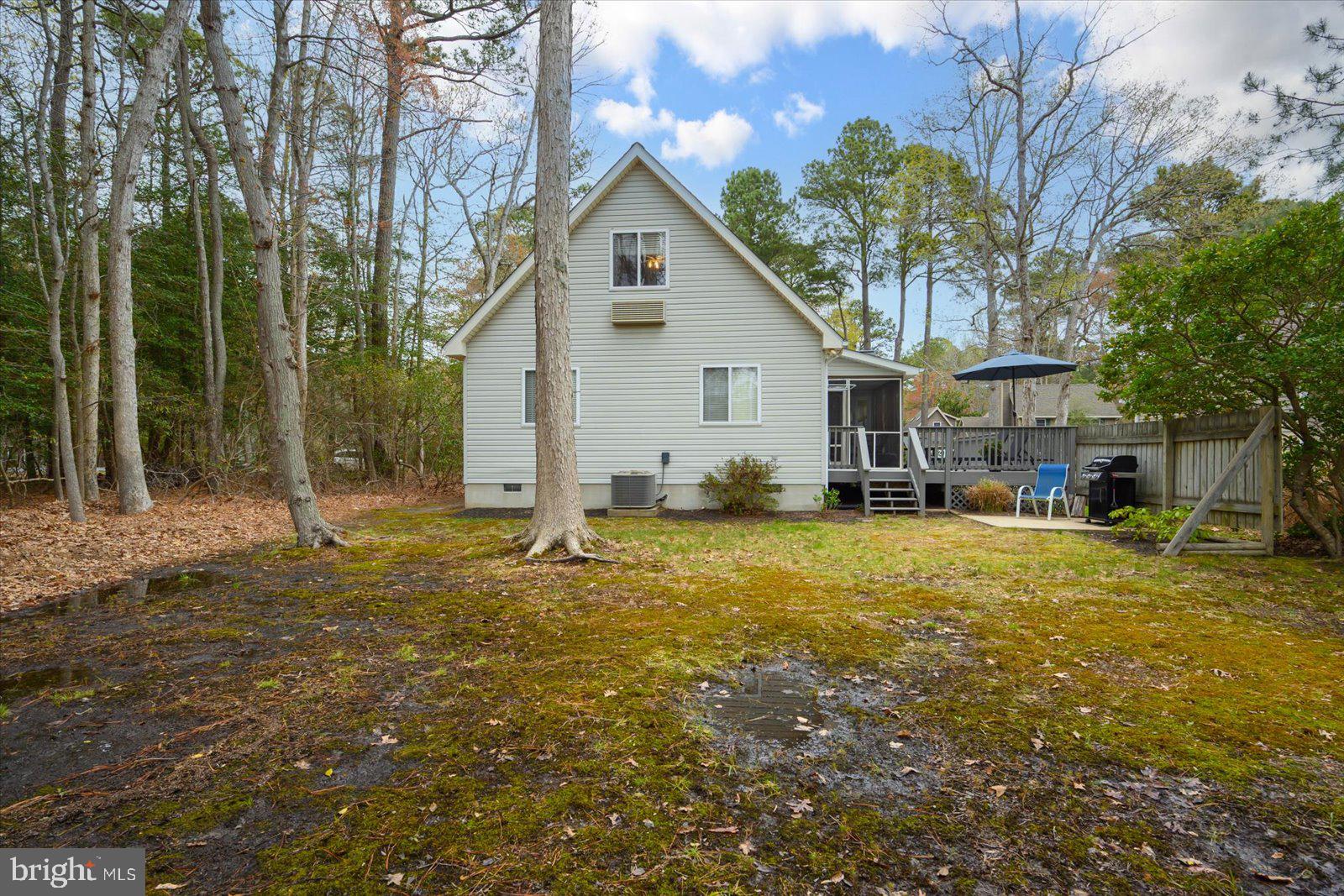74 Robin Hood Trail Ocean Pines, MD 21811 - Photo 49 of 59 a view of a house with a yard
