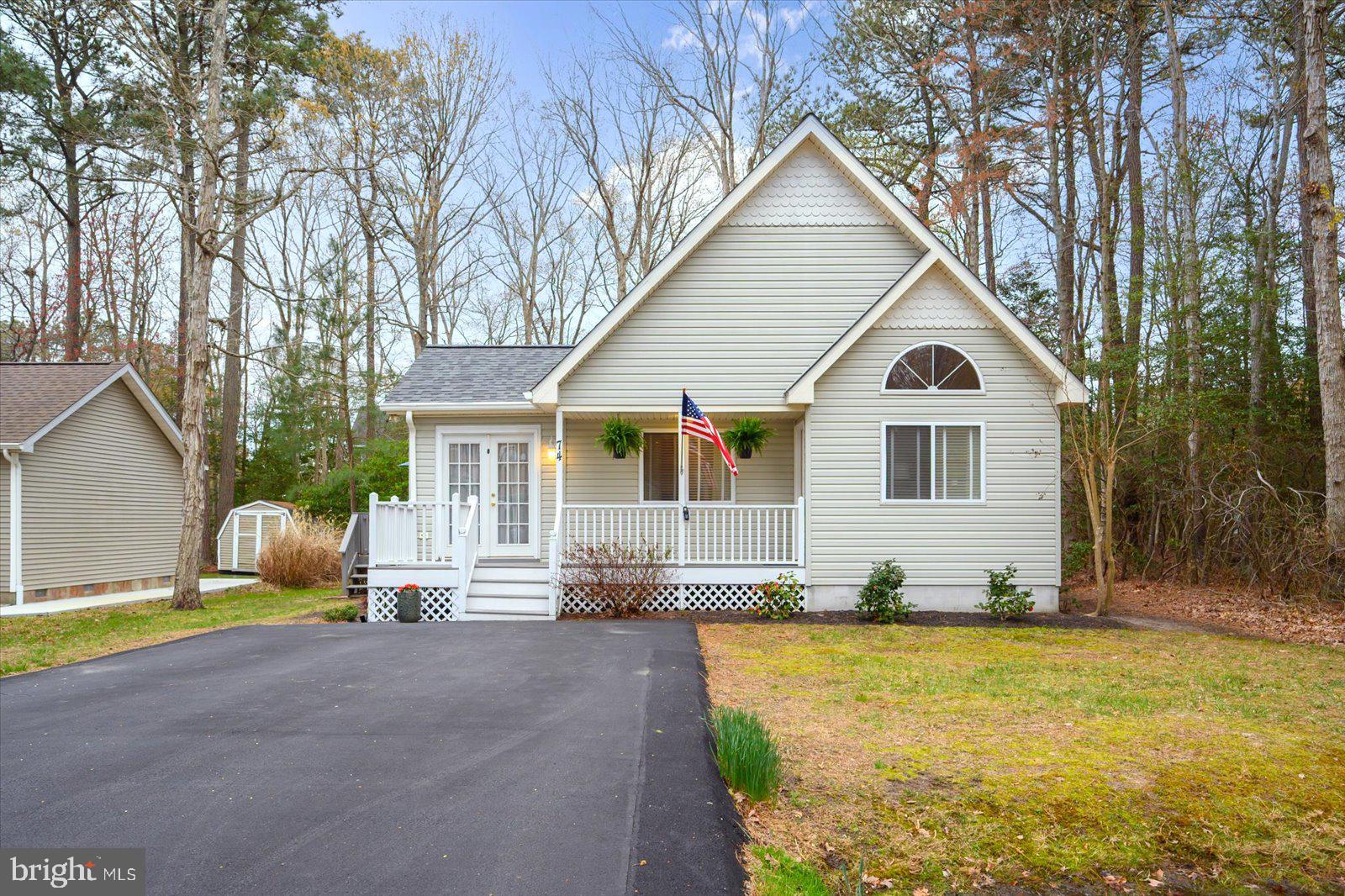 74 Robin Hood Trail Ocean Pines, MD 21811 - Photo 54 of 59 a view of a house with backyard and sitting area