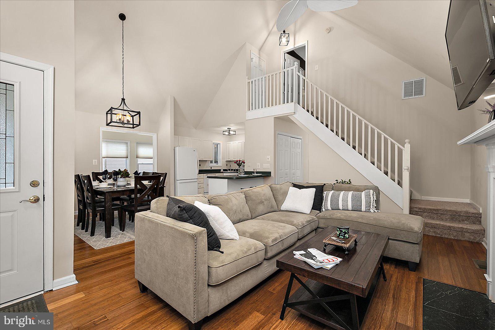74 Robin Hood Trail Ocean Pines, MD 21811 - Photo 6 of 59 a living room with furniture and a wooden floor