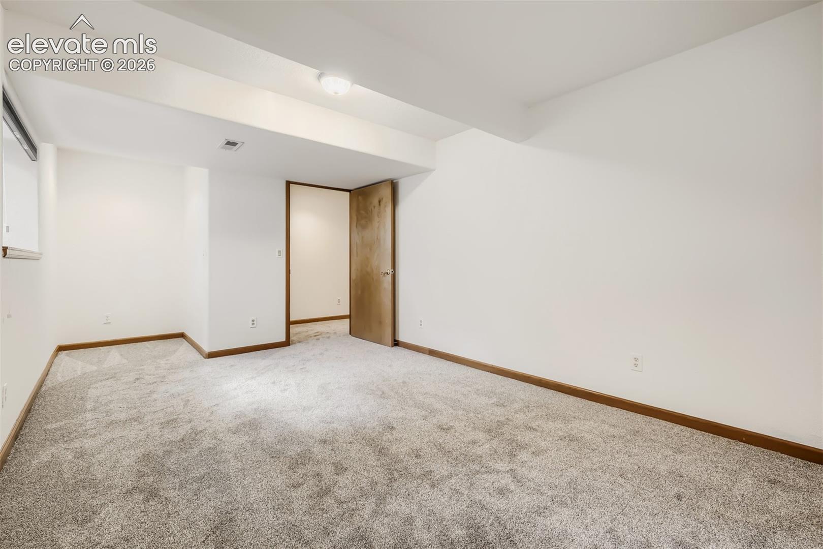 8750 Tannenbaum Road Colorado Springs, CO 80908 - Photo 39 of 50 Secondary bedroom