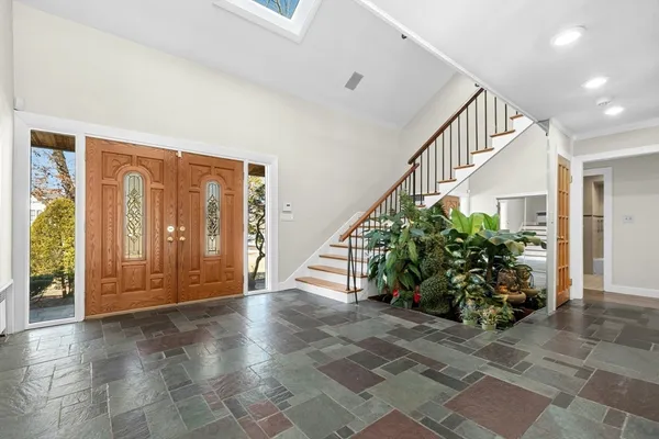 a view of entryway with stairs