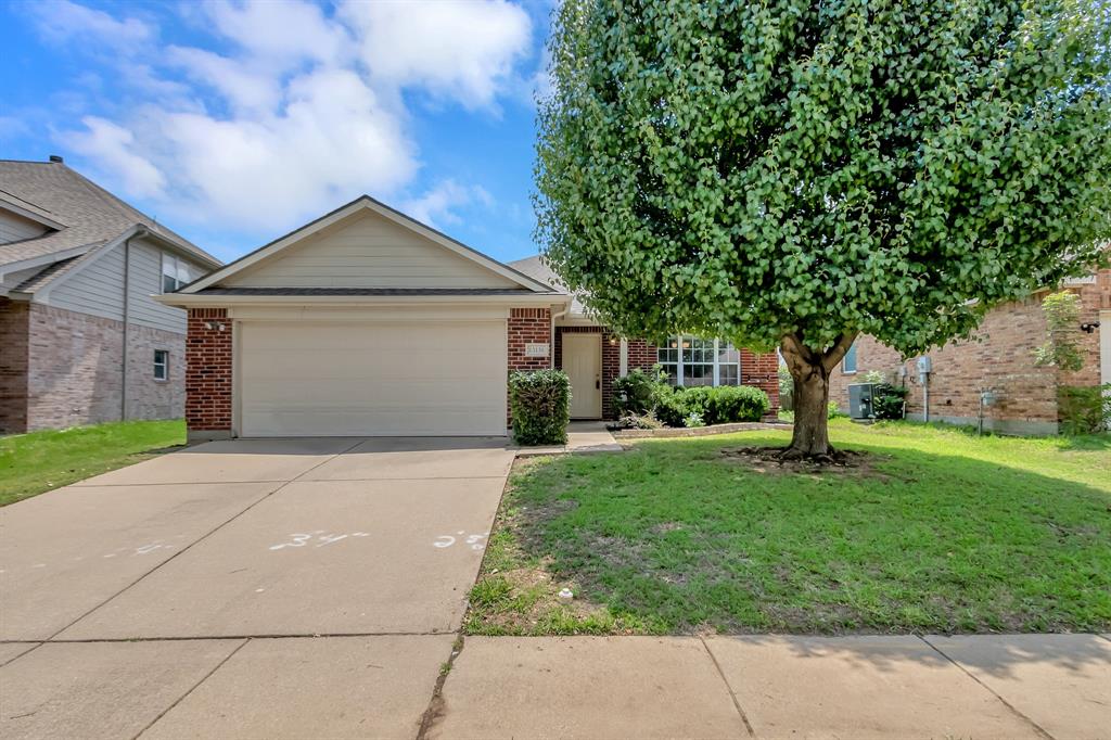 13136 Fieldstone Road Fort Worth, TX 76244 - Photo 1 of 1 a front view of a house with yard