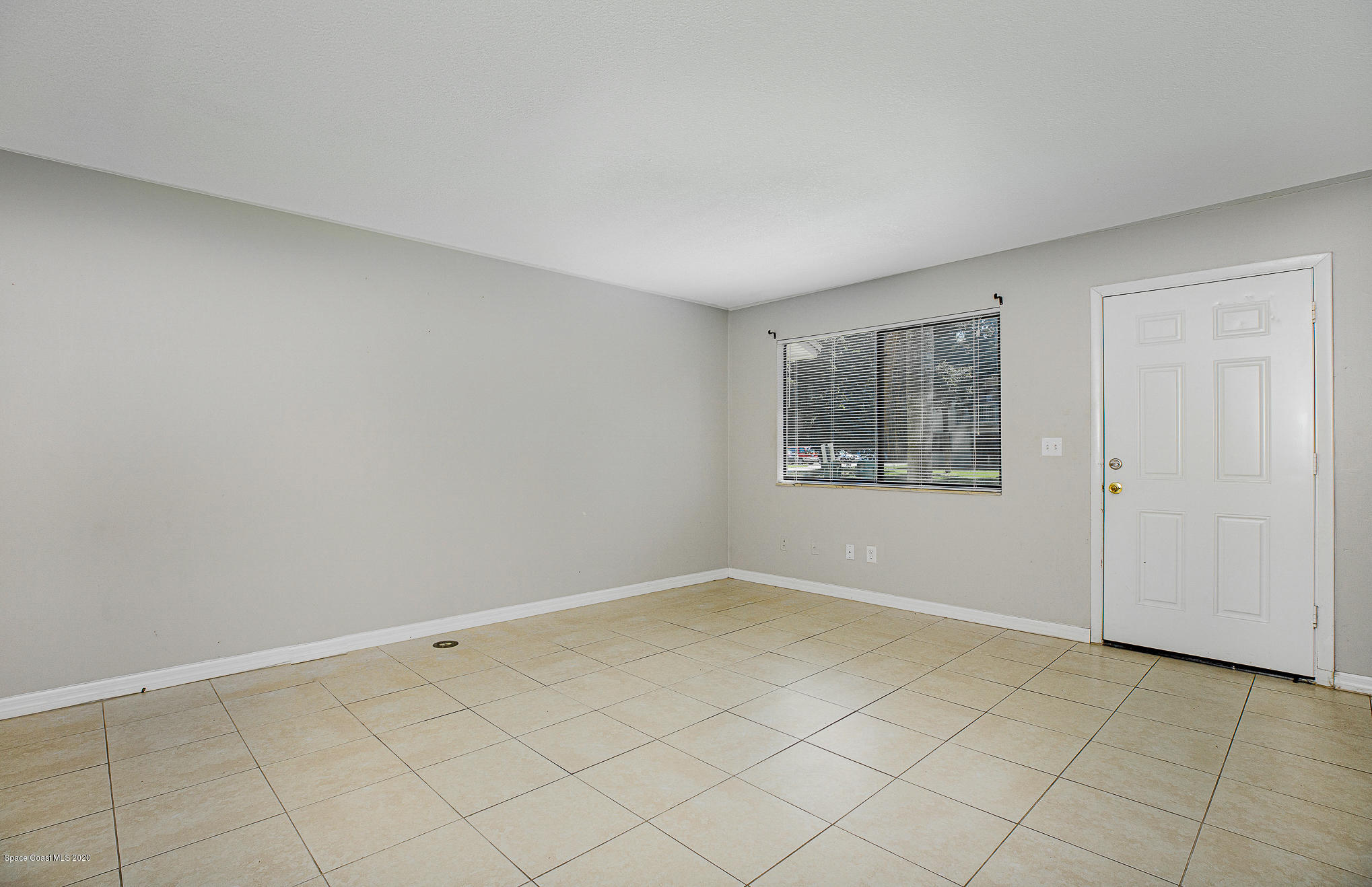 4014 Tree Ridge Lane Northeast Palm Bay, FL 32905 - Photo 4 of 22 Front Door & Window