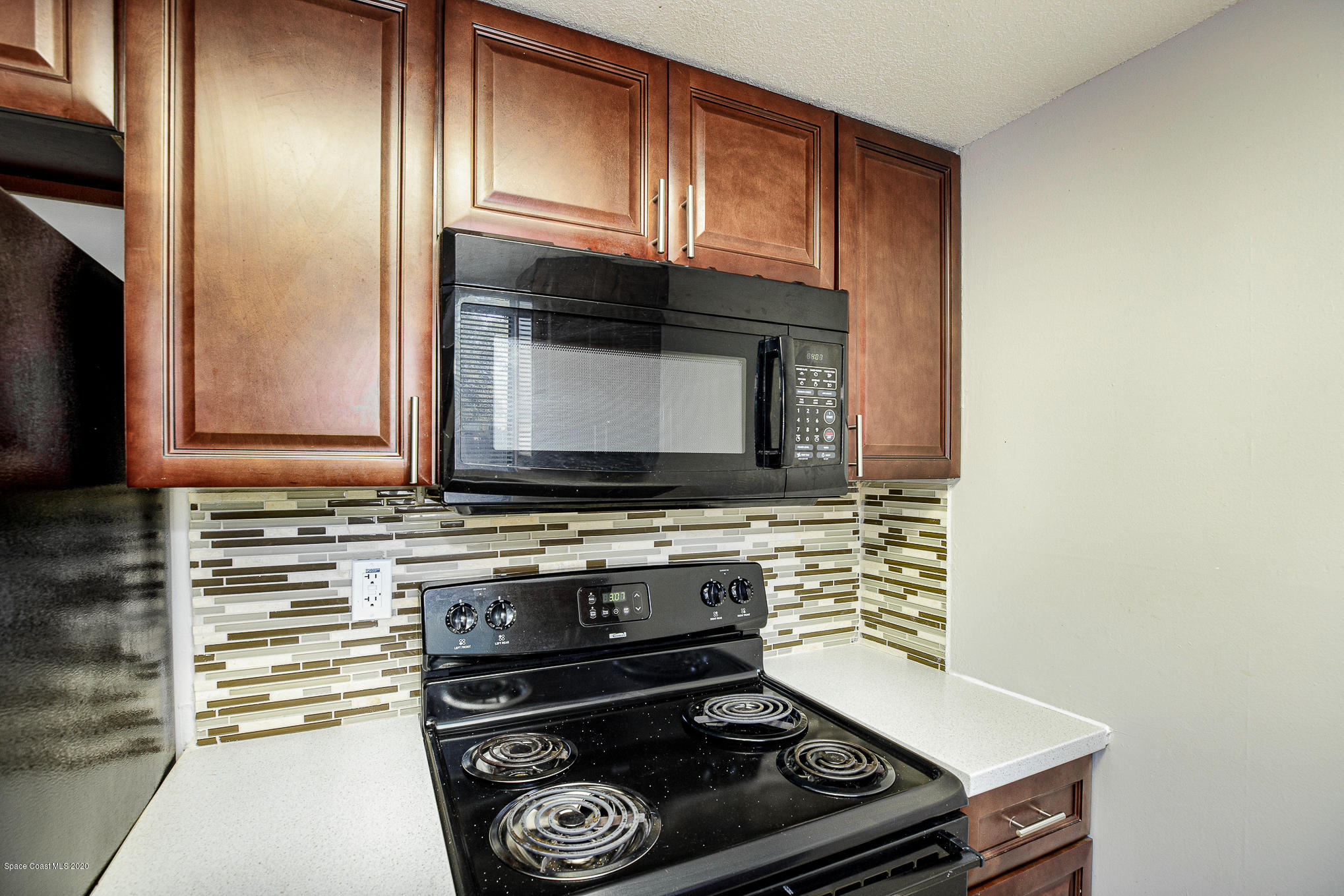 4014 Tree Ridge Lane Northeast Palm Bay, FL 32905 - Photo 7 of 22 Kitchen Cabinets