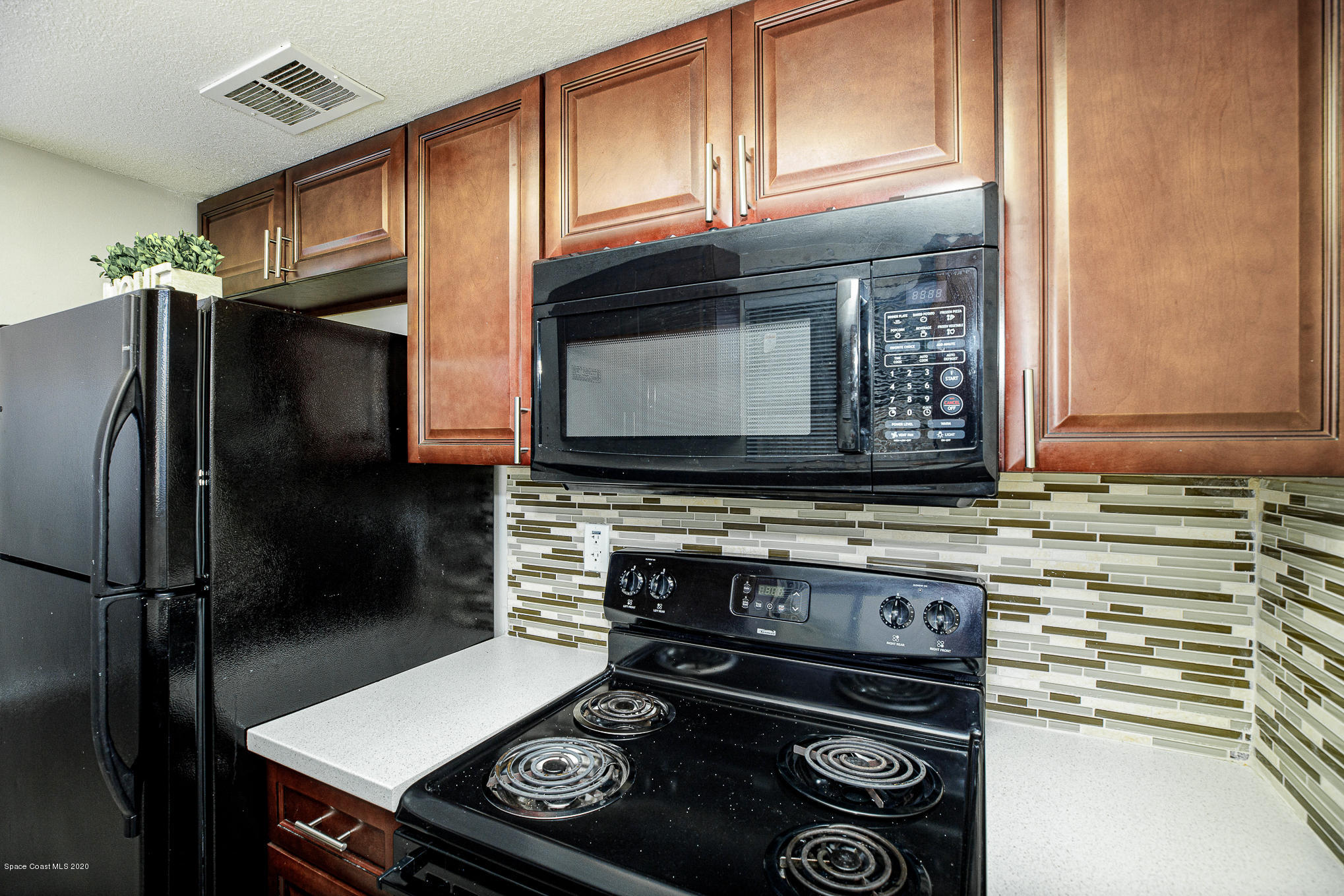 4014 Tree Ridge Lane Northeast Palm Bay, FL 32905 - Photo 8 of 22 Kitchen Appliances