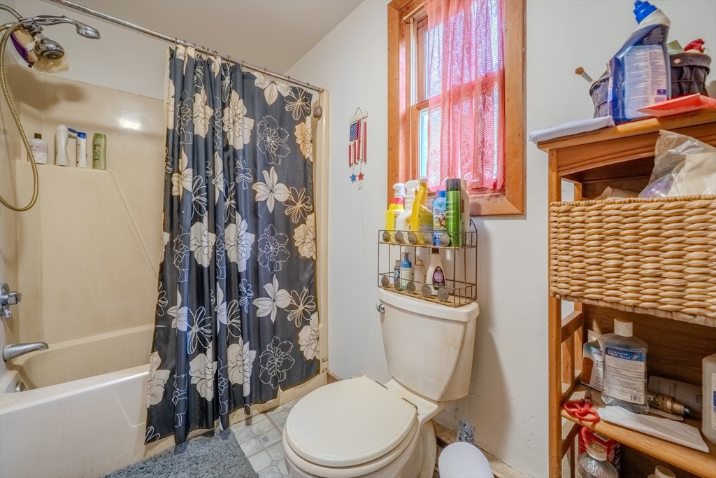 60 Valley Groton Ma Groton, MA 01450 - Photo 20 of 26 a white toilet sitting next to a bath tub and shower