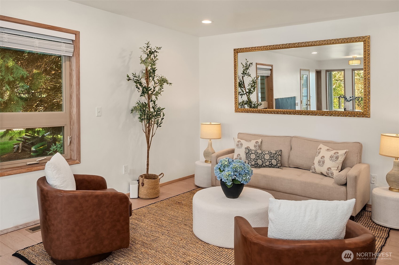 7010 Southwest Maury Park Road Vashon, WA 98070 - Photo 16 of 40 a living room with furniture and a potted plant