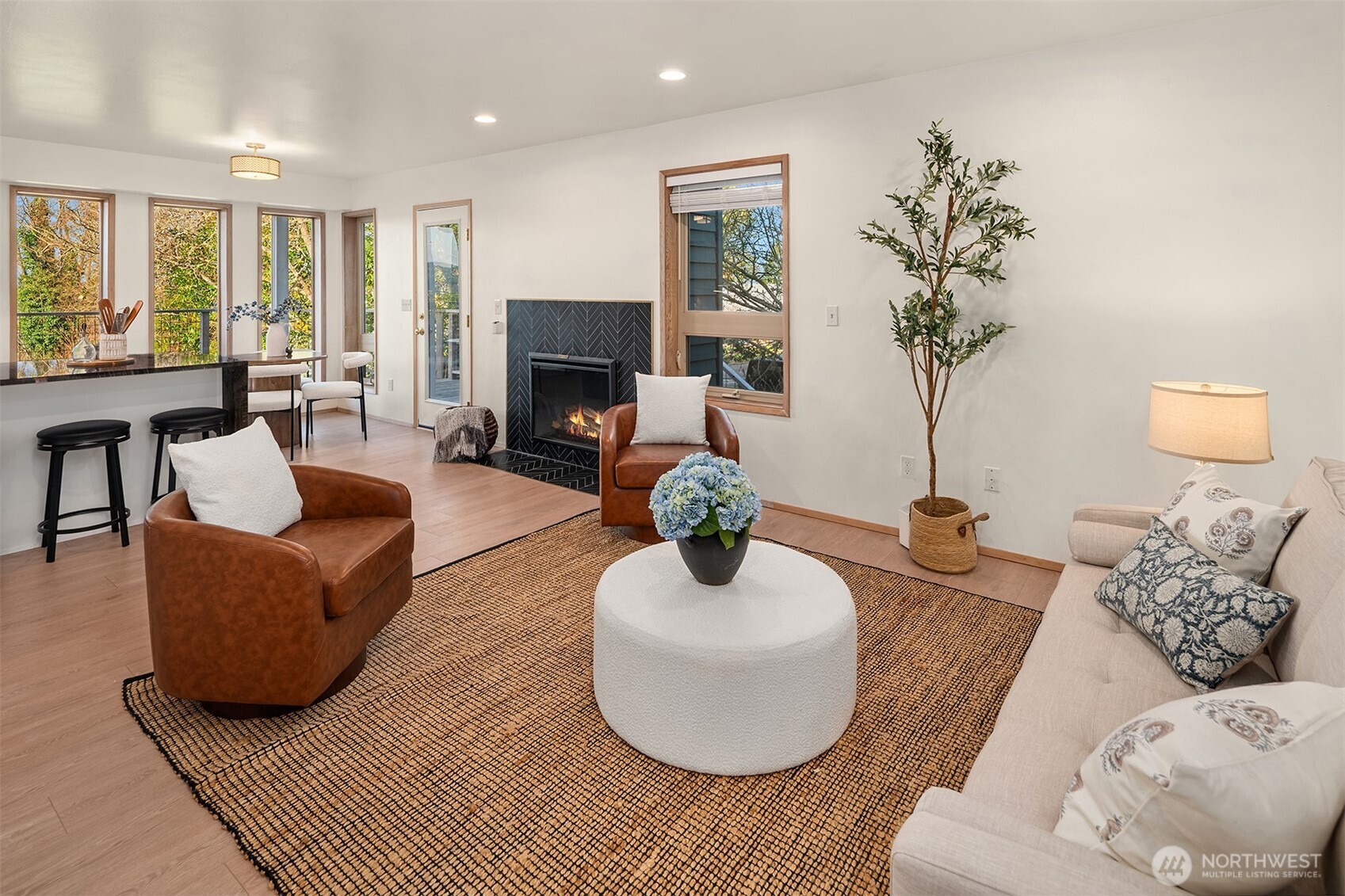 7010 Southwest Maury Park Road Vashon, WA 98070 - Photo 25 of 40 a living room with furniture and a fireplace