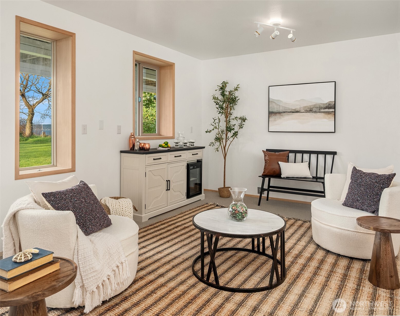 7010 Southwest Maury Park Road Vashon, WA 98070 - Photo 26 of 40 a living room with furniture and a table
