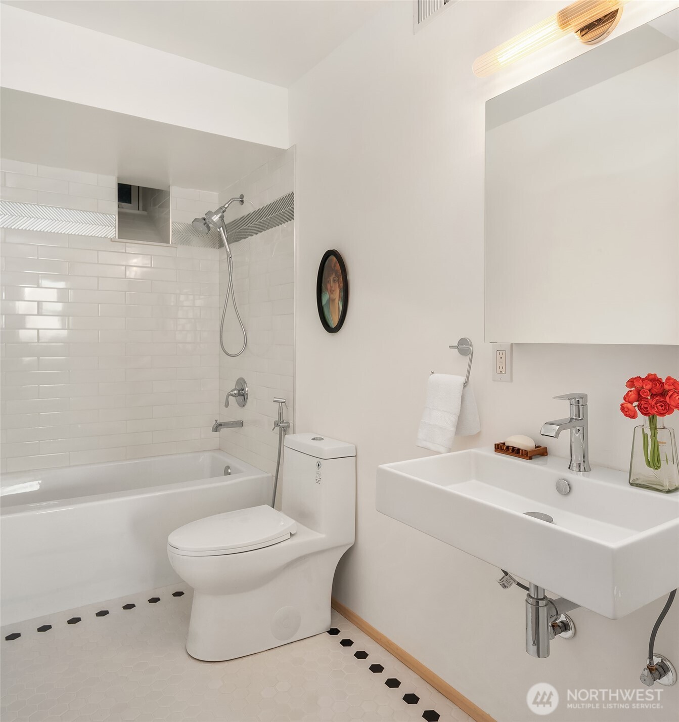 7010 Southwest Maury Park Road Vashon, WA 98070 - Photo 27 of 40 a bathroom with a sink toilet tub and shower