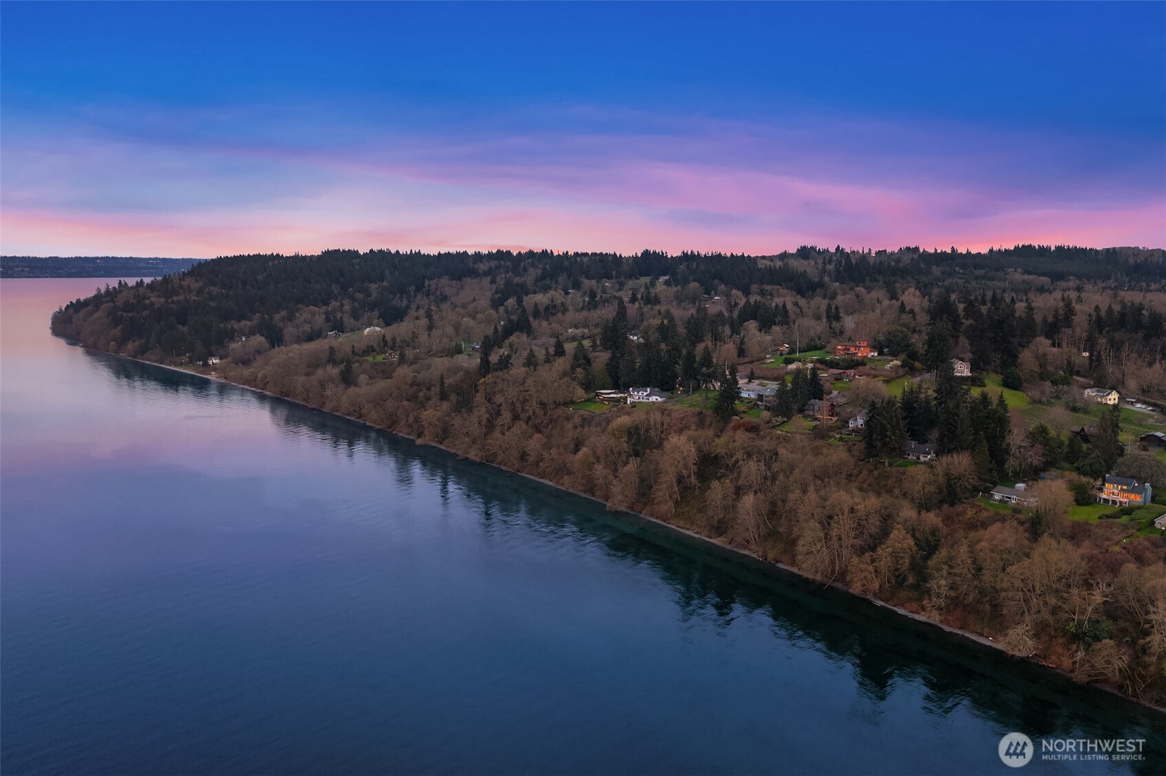 7010 Southwest Maury Park Road Vashon, WA 98070 - Photo 39 of 40 a view of a city with sunset