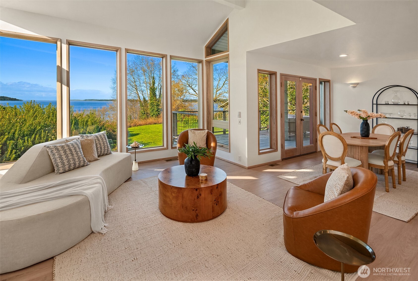 7010 Southwest Maury Park Road Vashon, WA 98070 - Photo 7 of 40 a living room with furniture and a large window