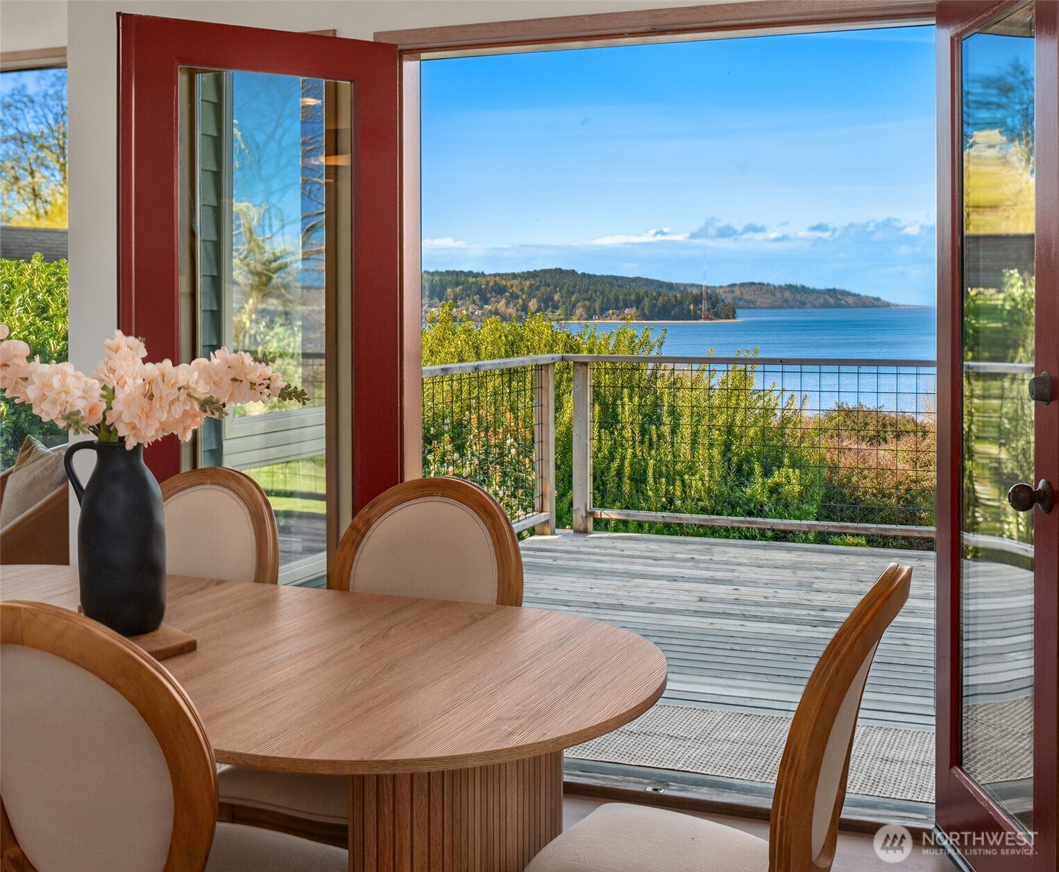7010 Southwest Maury Park Road Vashon, WA 98070 - Photo 10 of 40 a view of a dining room with furniture window and outside view