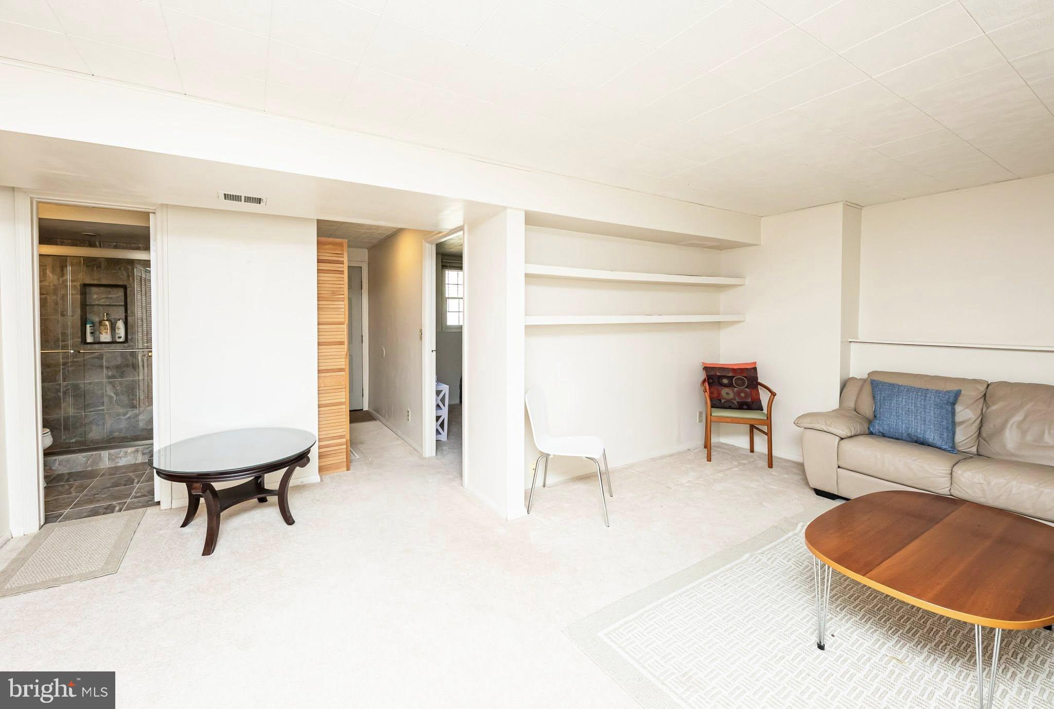 1803 East Beech Road Sterling, VA 20164 - Photo 12 of 38 a living room with furniture and a window
