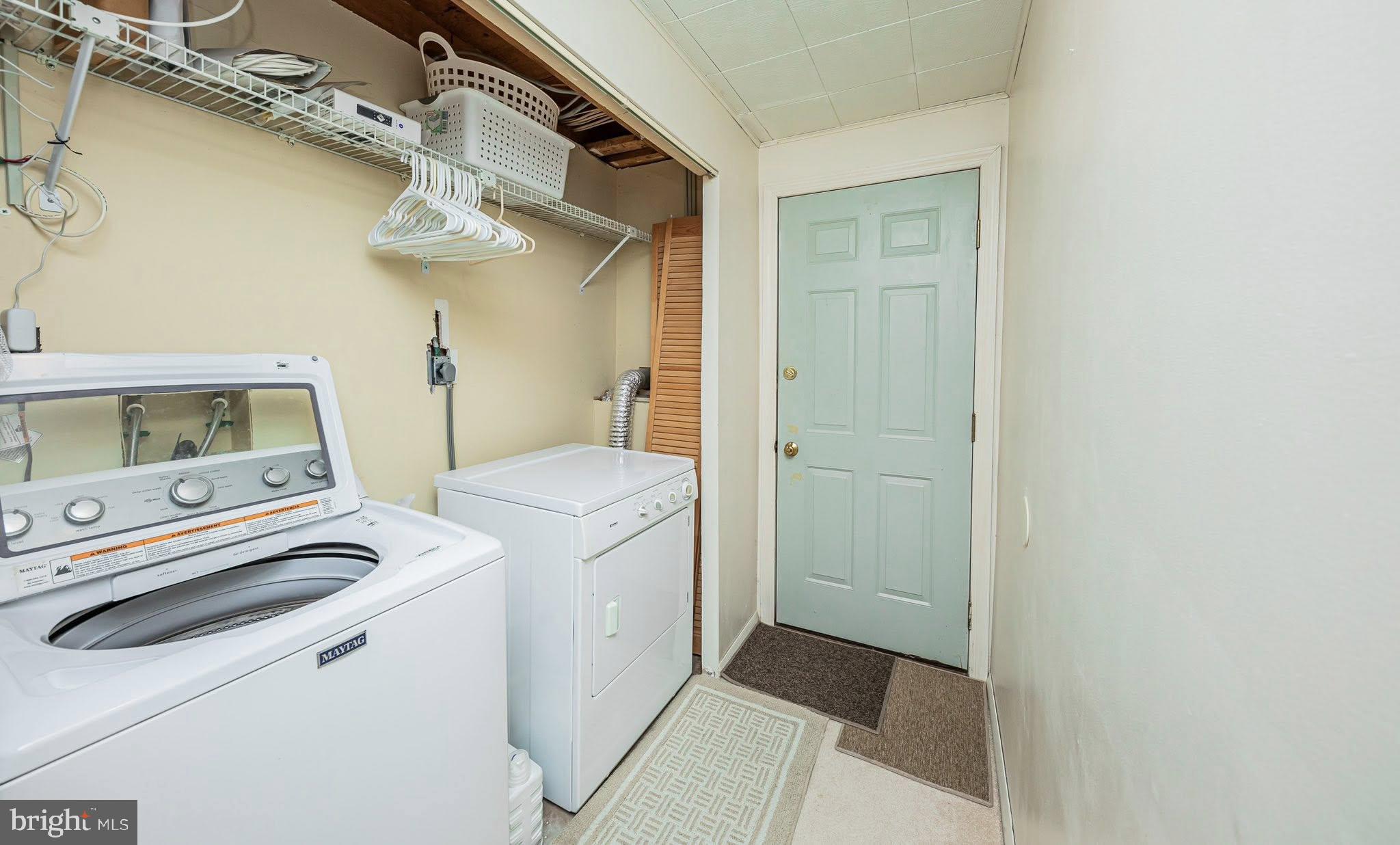 1803 East Beech Road Sterling, VA 20164 - Photo 16 of 38 a utility room with dryer and washer