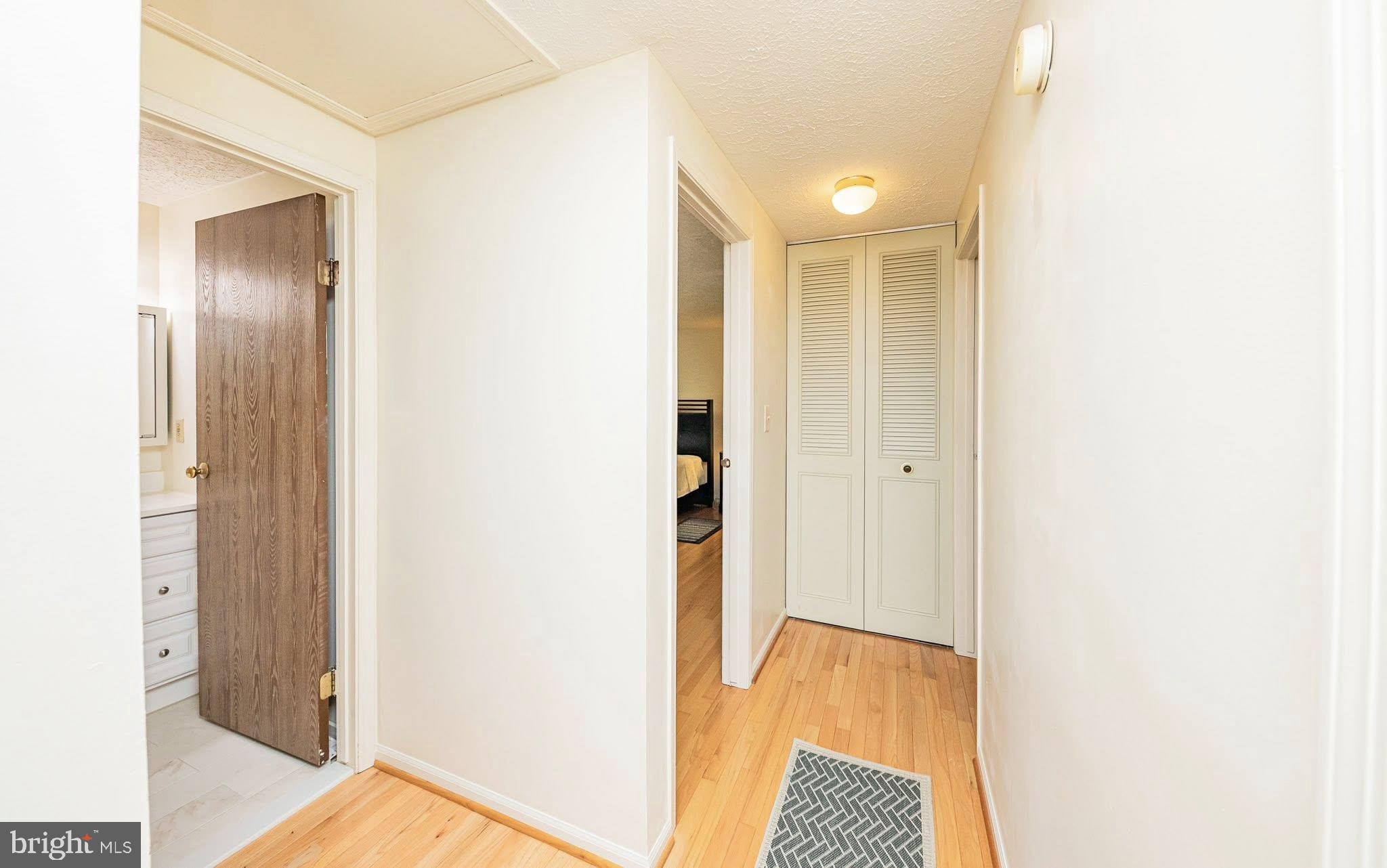 1803 East Beech Road Sterling, VA 20164 - Photo 18 of 38 a view of hallway with wooden floor