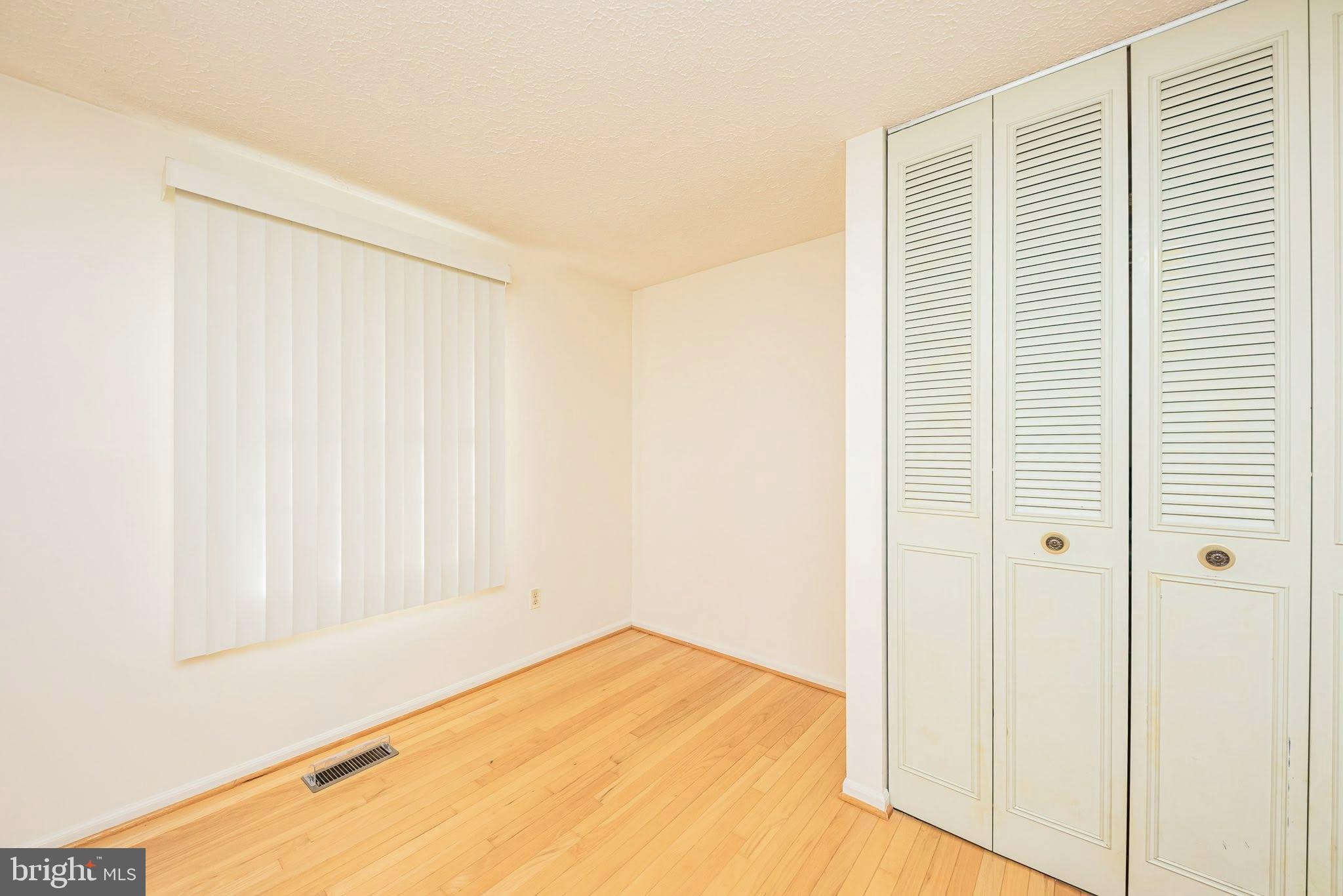 1803 East Beech Road Sterling, VA 20164 - Photo 20 of 38 a view of empty room with wooden floor