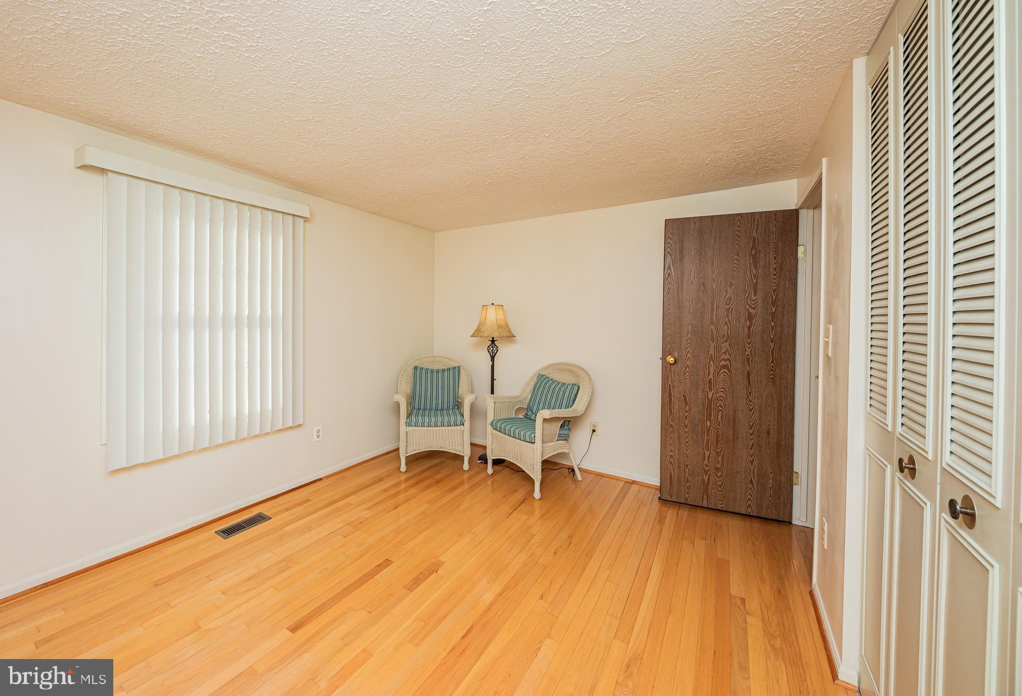 1803 East Beech Road Sterling, VA 20164 - Photo 24 of 38 a workspace with a table and chair