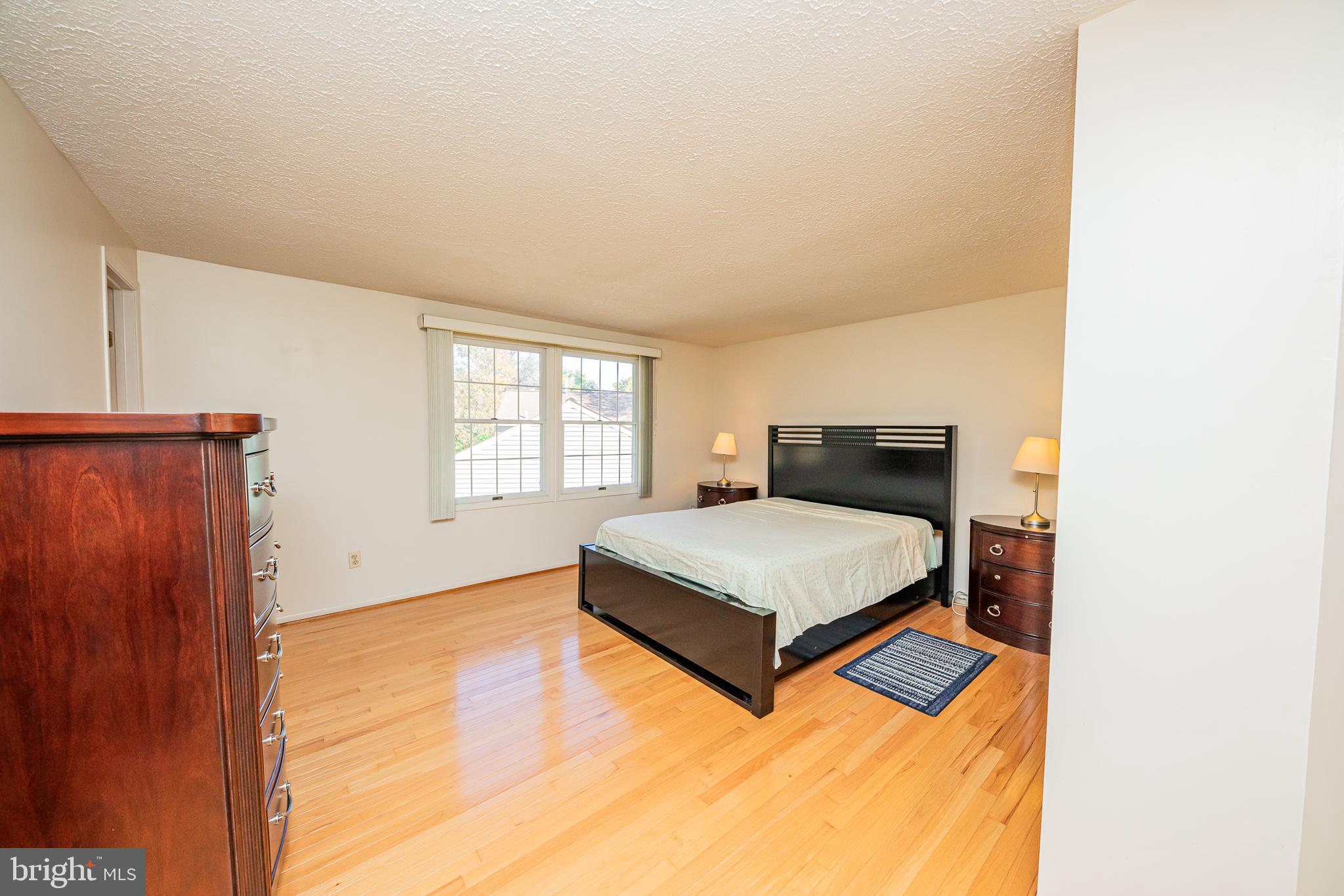 1803 East Beech Road Sterling, VA 20164 - Photo 27 of 38 a bedroom with a bed and window
