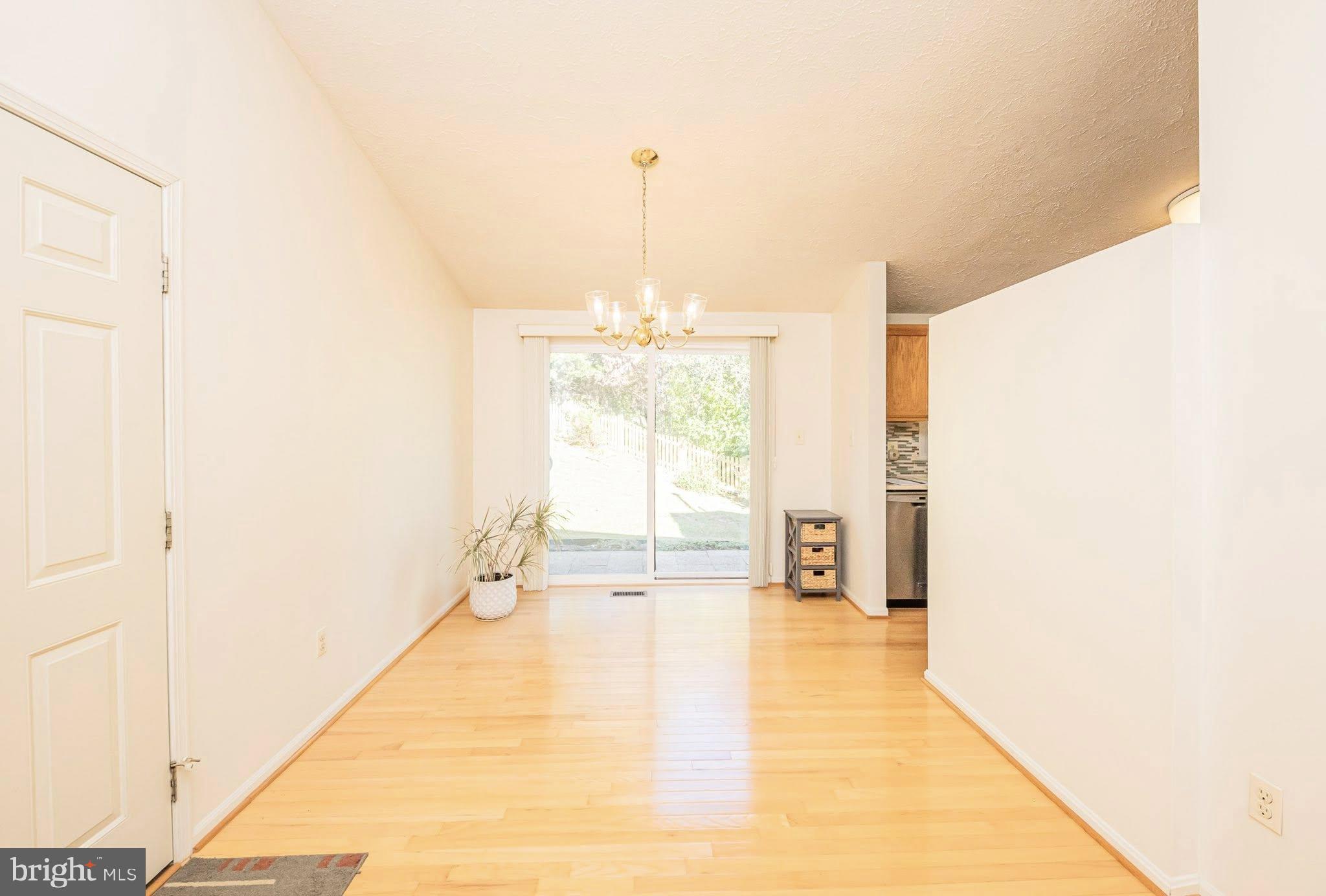 1803 East Beech Road Sterling, VA 20164 - Photo 5 of 38 a hallway with a window