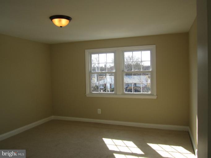 2107 Rolling Rd. Windsor Mill, MD 21244 - Photo 15 of 29 an empty room with a window