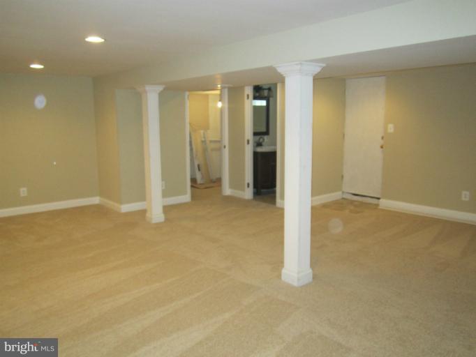 2107 Rolling Rd. Windsor Mill, MD 21244 - Photo 19 of 29 an empty room with closet and a bathroom