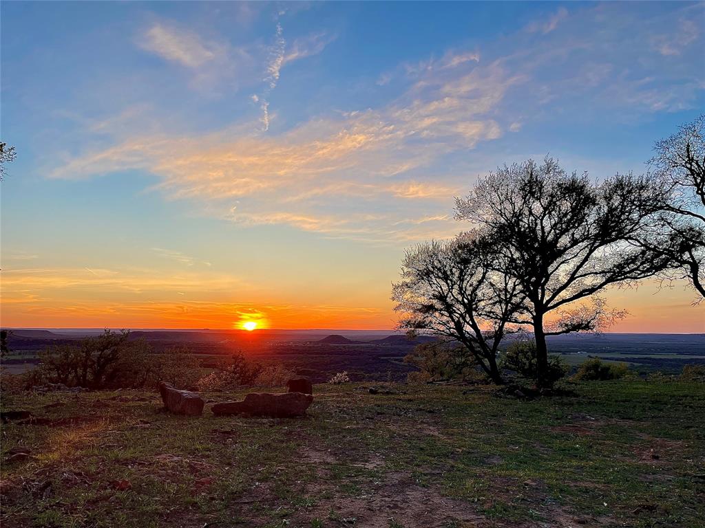 1390 Clayton Mt Road Gordon, TX 76453 - Photo 11 of 21 a view of sunset with green space