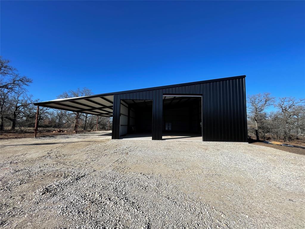 1390 Clayton Mt Road Gordon, TX 76453 - Photo 10 of 21 a front view of a house