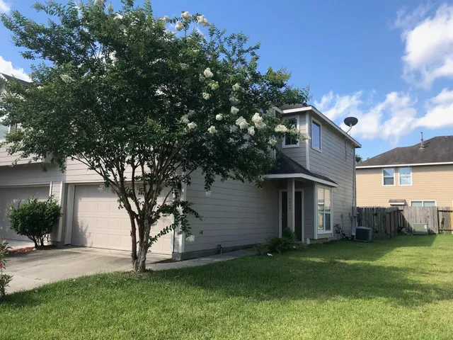a view of a backyard with a garden