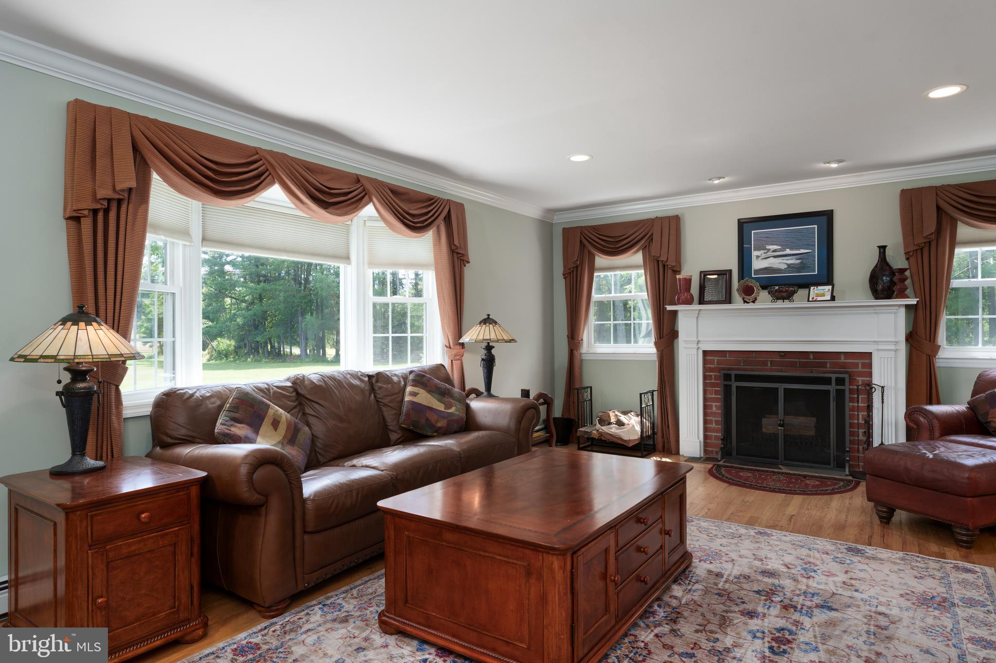 56 Valley Road Lambertville, NJ 08530 - Photo 18 of 49 a living room with furniture and a fireplace