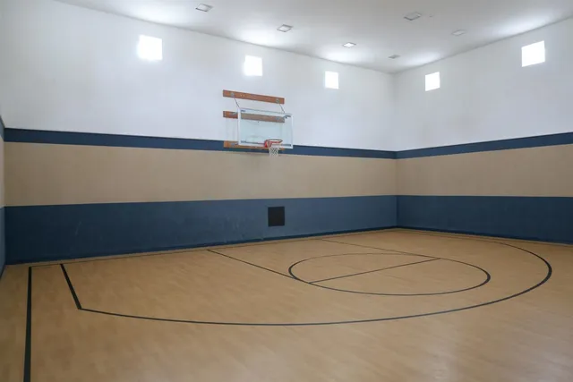 a view of a lake with houses in the back