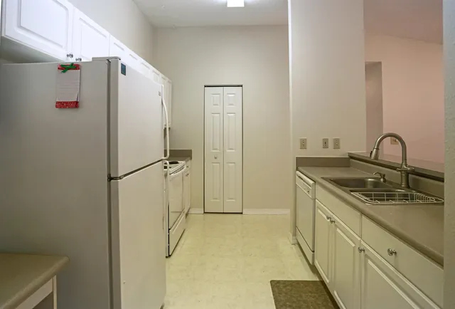 a bathroom with a sink and mirror