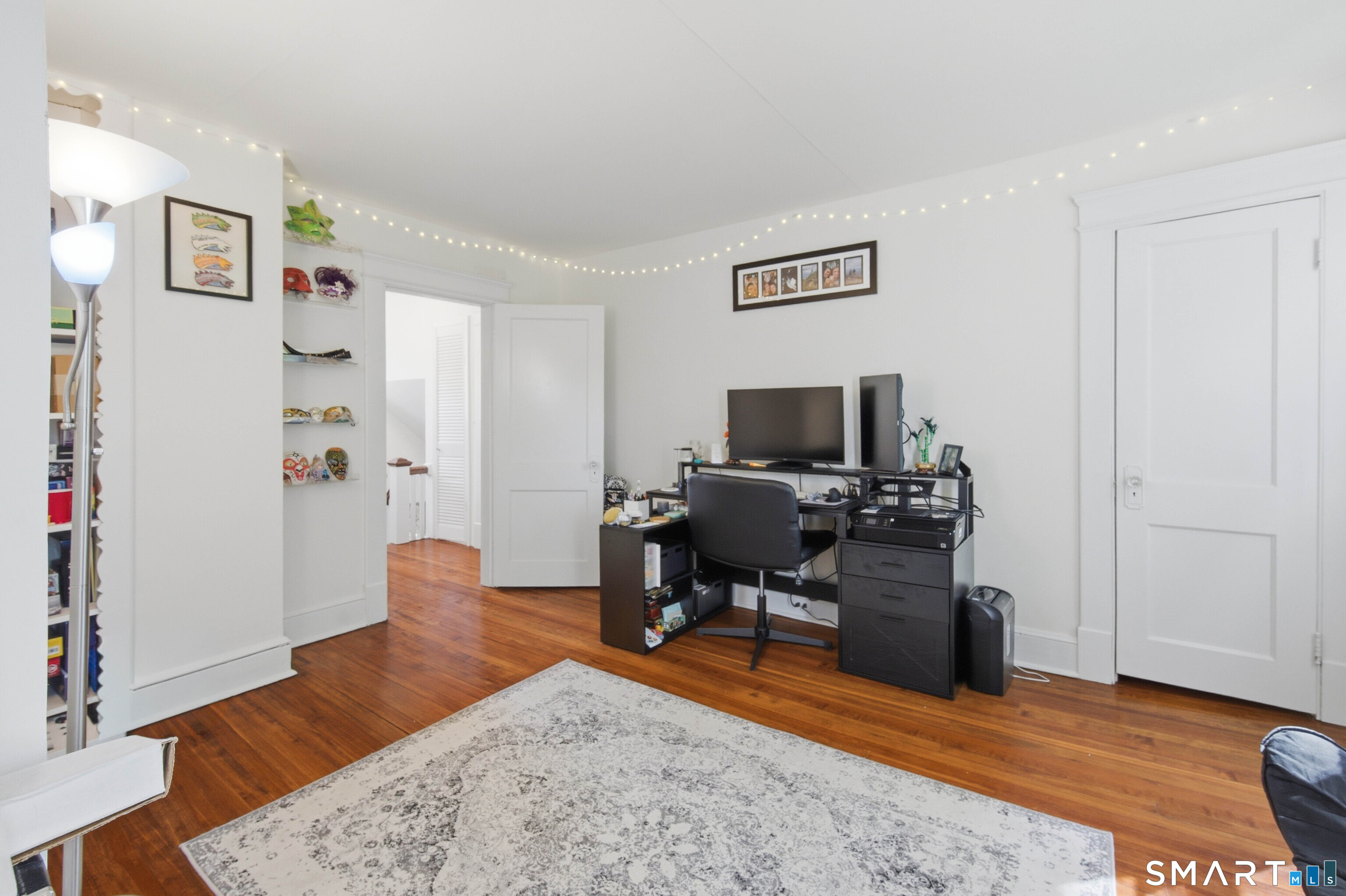 120 May Street Naugatuck, CT 06770 - Photo 23 of 31 a view of a workspace with furniture and wooden floor