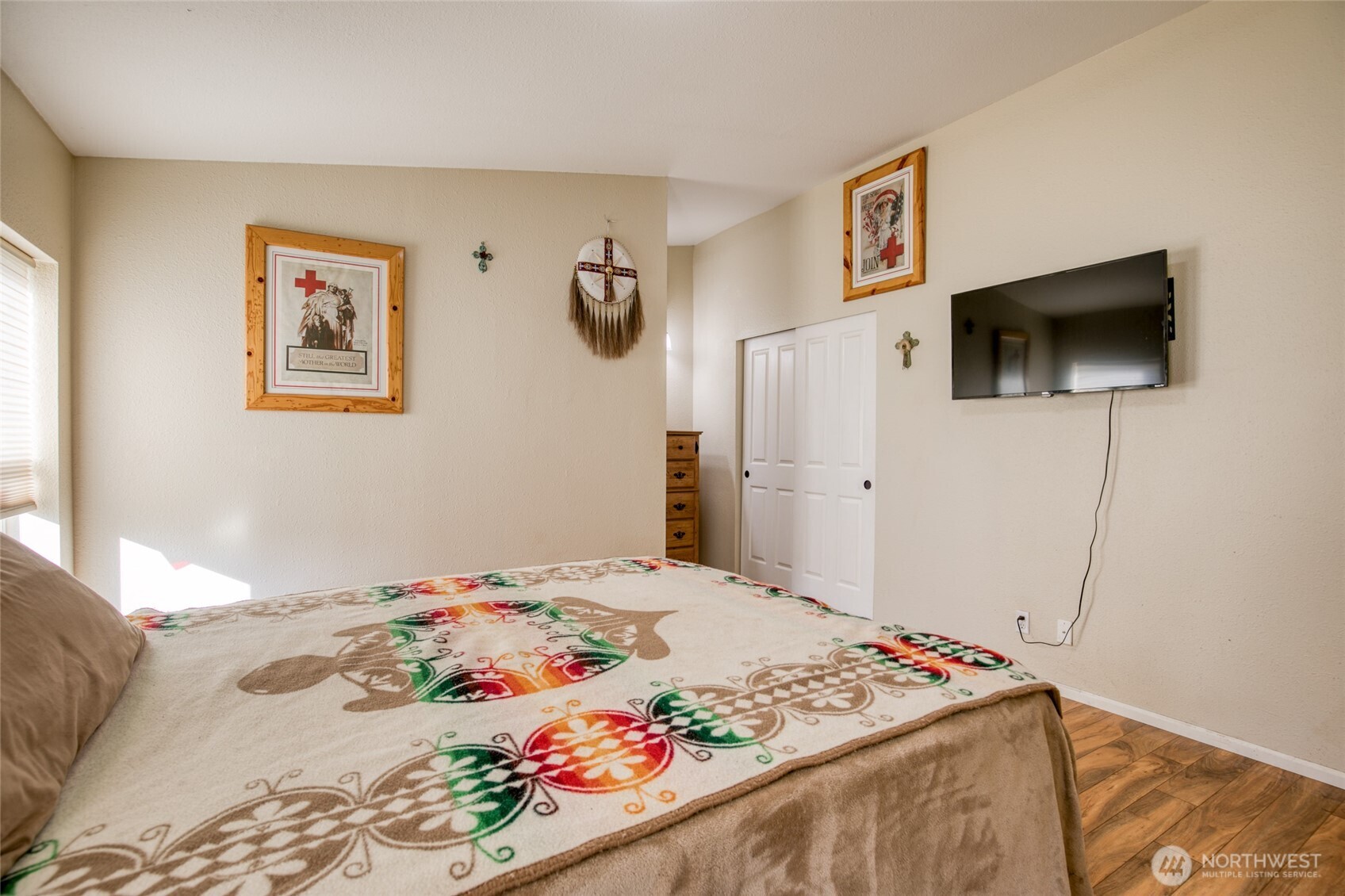 4687 Wishkah Road Aberdeen, WA 98520 - Photo 13 of 29 a bedroom with a bed and a flat screen tv