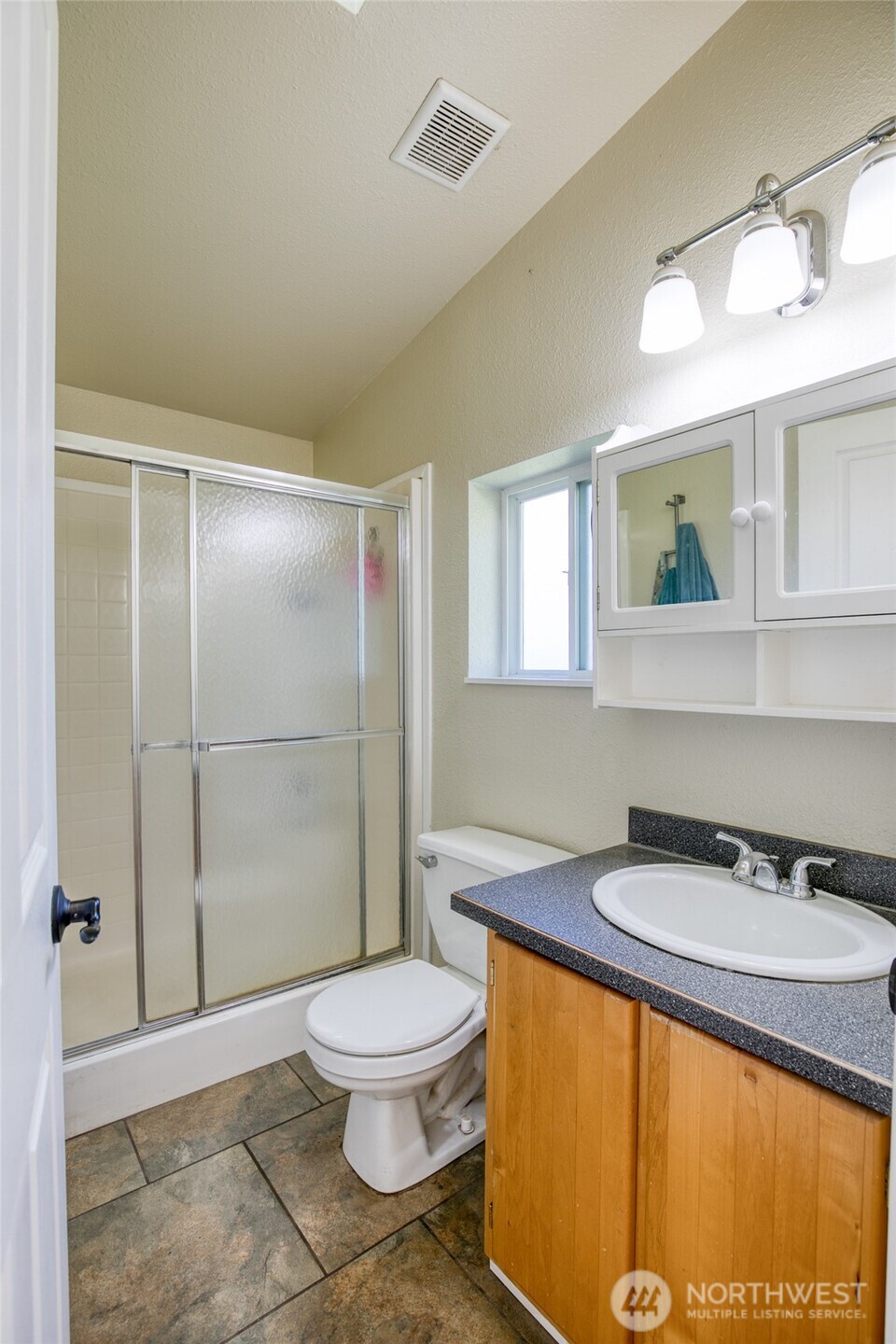 4687 Wishkah Road Aberdeen, WA 98520 - Photo 14 of 29 a bathroom with a sink and a mirror