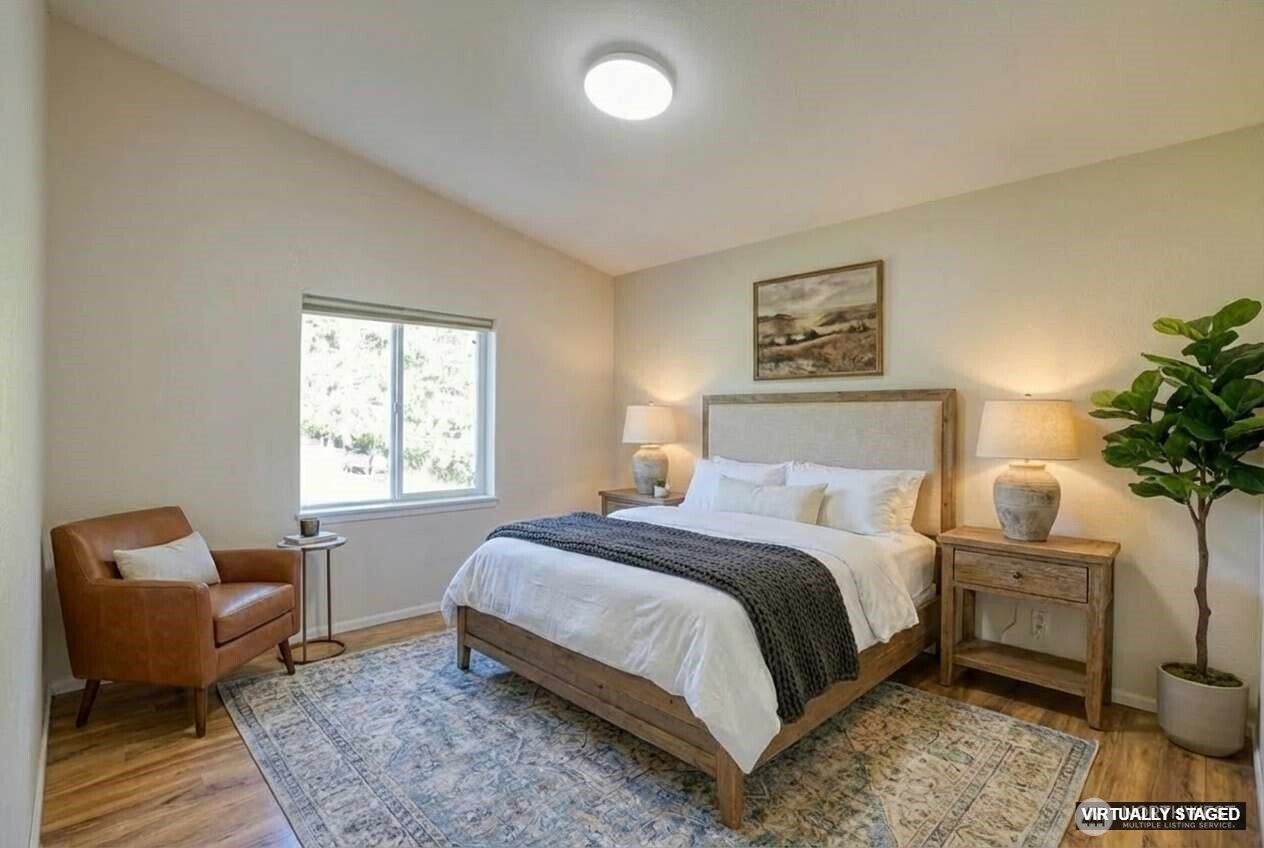 4687 Wishkah Road Aberdeen, WA 98520 - Photo 16 of 29 a bedroom with a bed and a couch