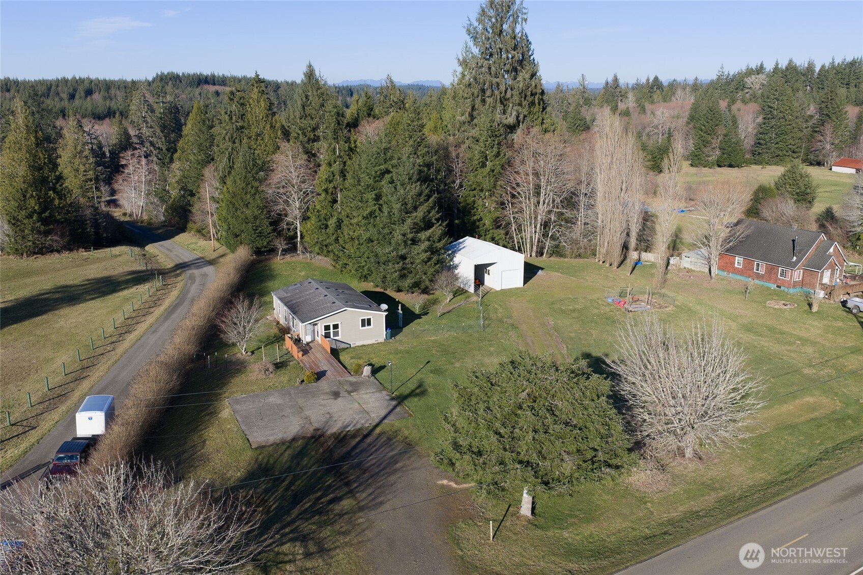4687 Wishkah Road Aberdeen, WA 98520 - Photo 24 of 29 a view of a houses with a park