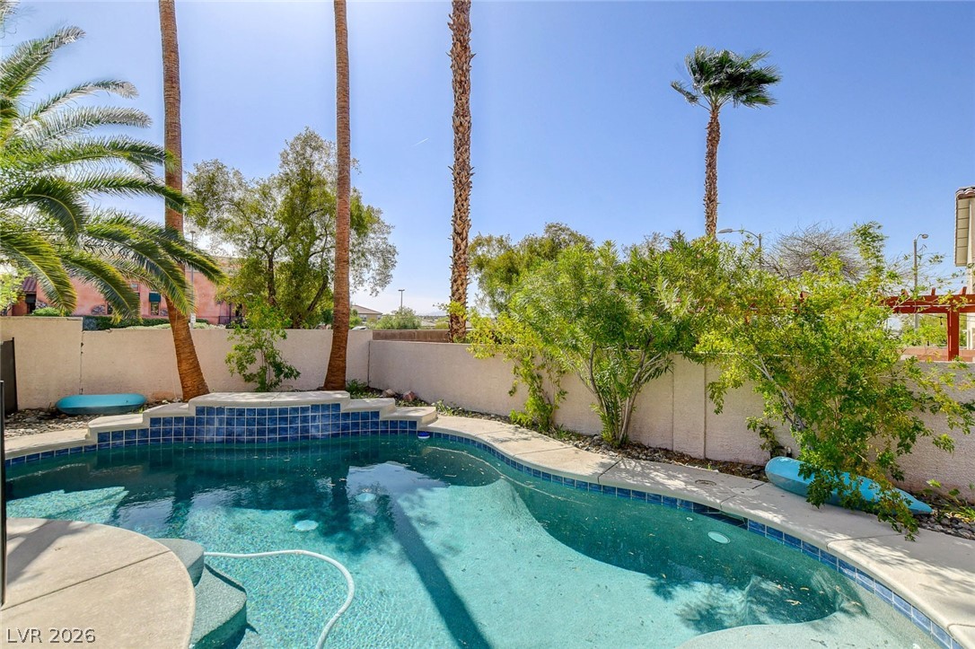 191 Verde Ridge Court Henderson, NV 89012 - Photo 35 of 36 View of pool with a fenced backyard