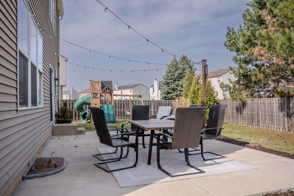 250 Tiger Street Bolingbrook, IL 60490 - Photo 34 of 36 a view of a chairs and table in patio