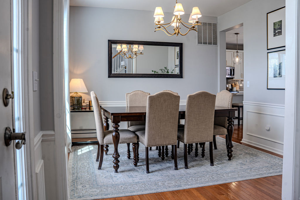 250 Tiger Street Bolingbrook, IL 60490 - Photo 4 of 36 a view of a dining room with furniture and chandelier