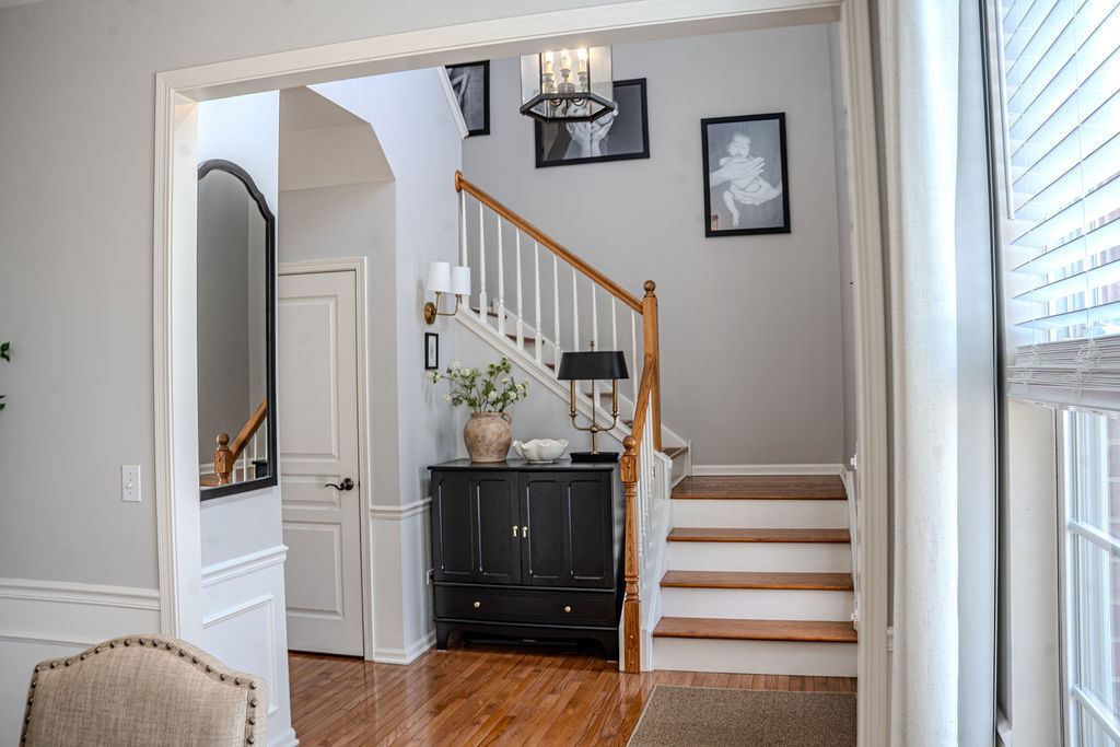 250 Tiger Street Bolingbrook, IL 60490 - Photo 5 of 36 a view of entryway with wooden floor and stairs